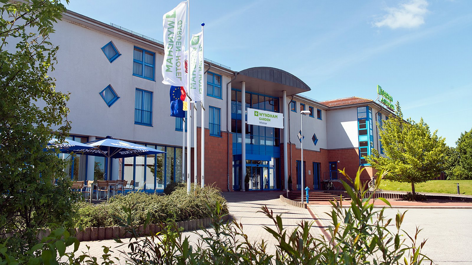 Gesundheitsreise mit Zuschuss Ihrer Krankenkasse nach Wismar. Foto 1 zeigt eine Impression von WYNDHAM GARDEN oder seiner Umgebung.